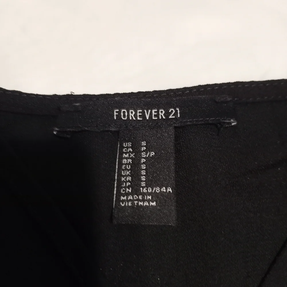 forever21 women's long-sleeved shirt with design on the front size‎ S